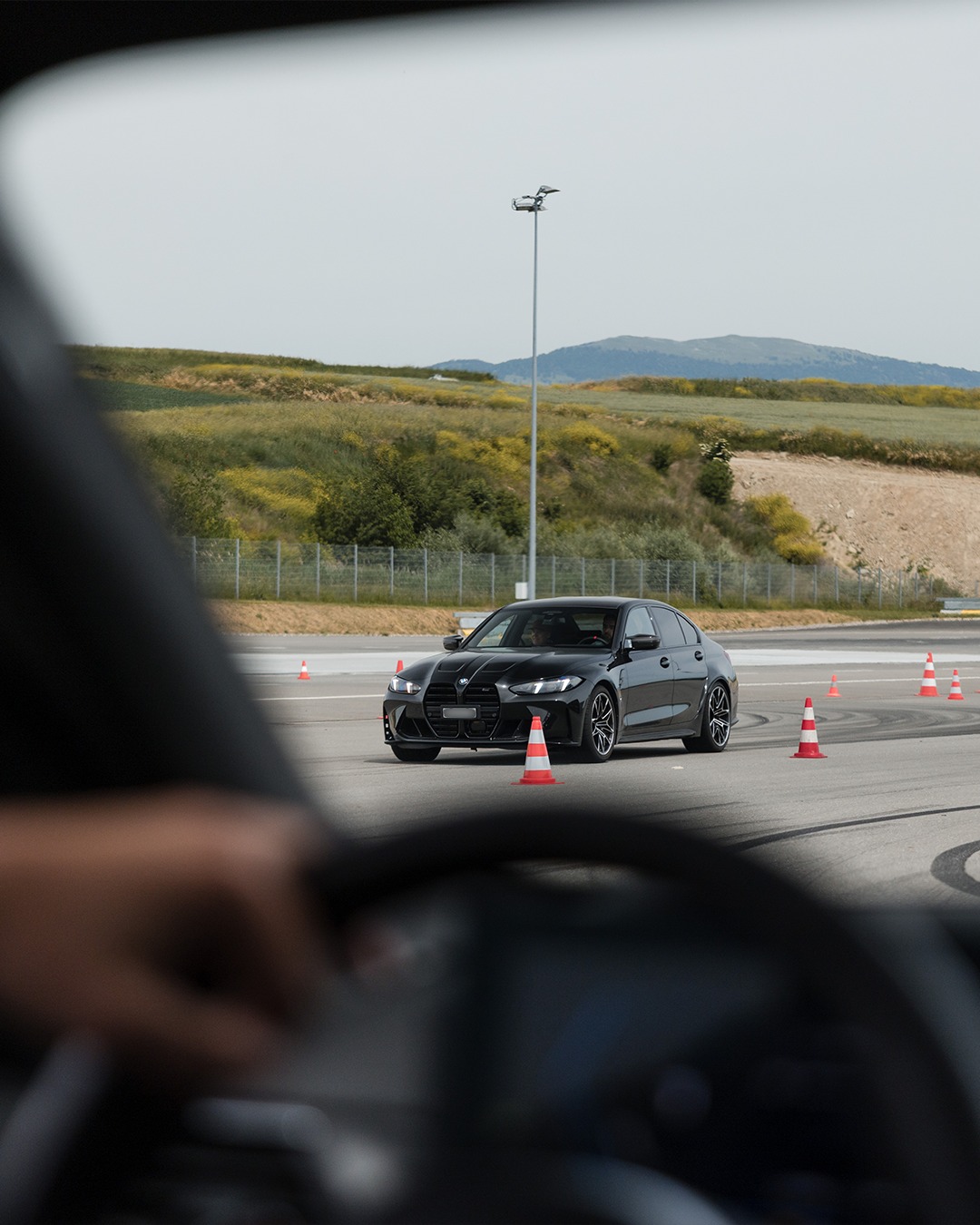 Emil Frey au circuit TCS de Cossonay : Une M3 vue à travers le pare-brise